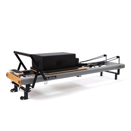 Peak Pilates fit Reformer with Long/Short Box, full side view with the box mounted on the grey carriage