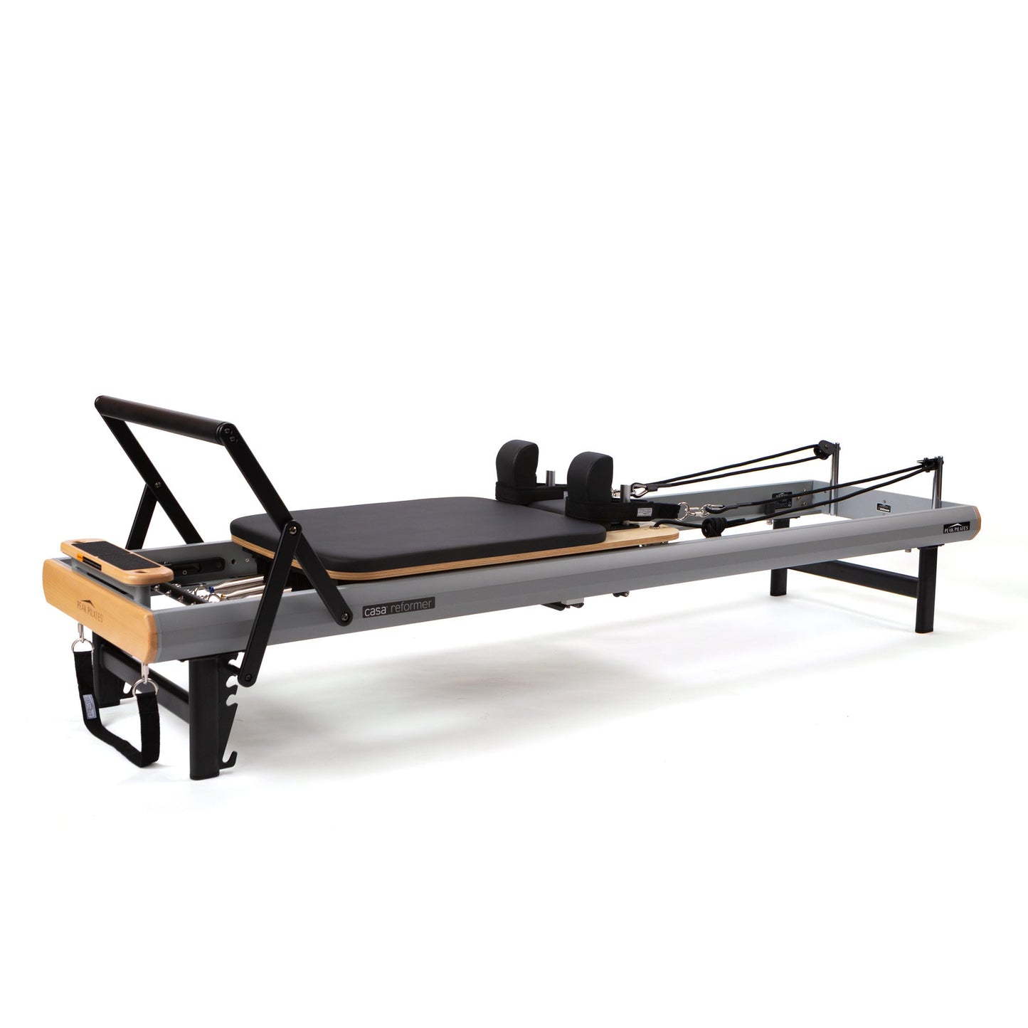 Peak Pilates casa Reformer with Long/Short Box, angled side view of the studio-height powder-coated aluminum frame and carriage