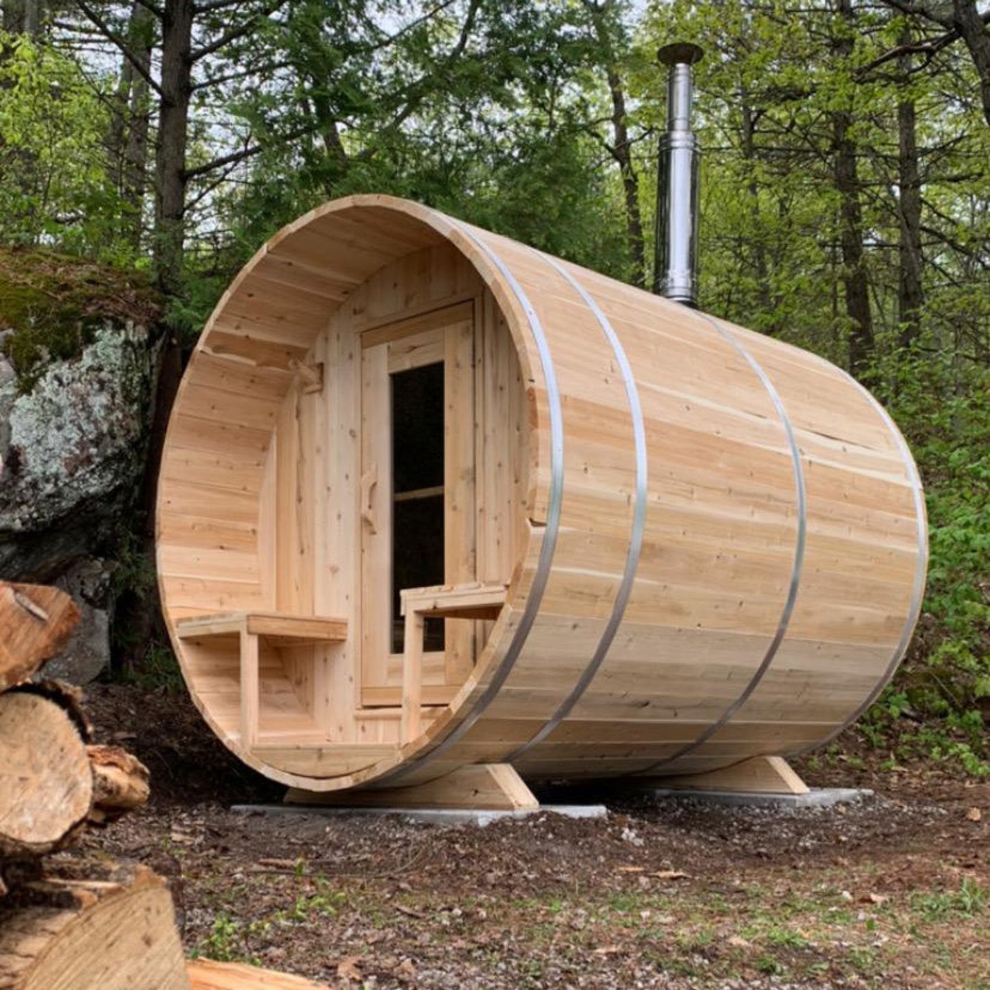 Canadian Timber Serenity 5-person white cedar barrel sauna, installed outdoors