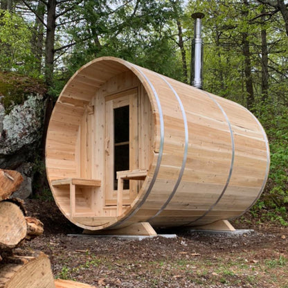 Canadian Timber Serenity 5-person white cedar barrel sauna, installed outdoors
