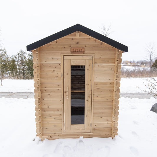 Canadian Timber Granby 3-person white cedar cabin sauna, installed outdoors in snow