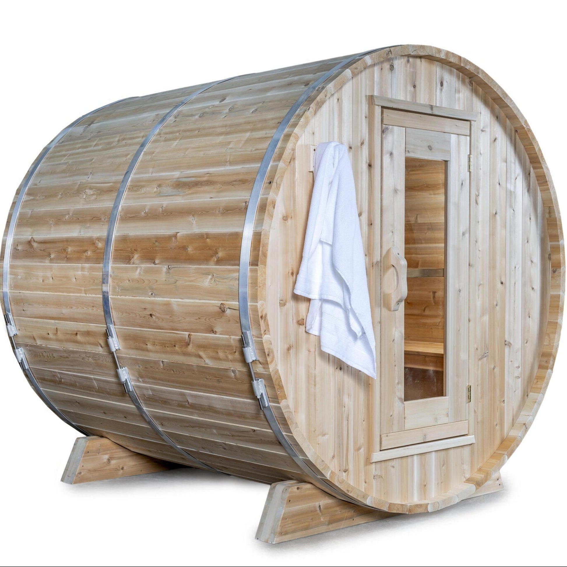Canadian Timber Harmony 4-person white cedar barrel sauna, three-quarter view with a towel, on a white background