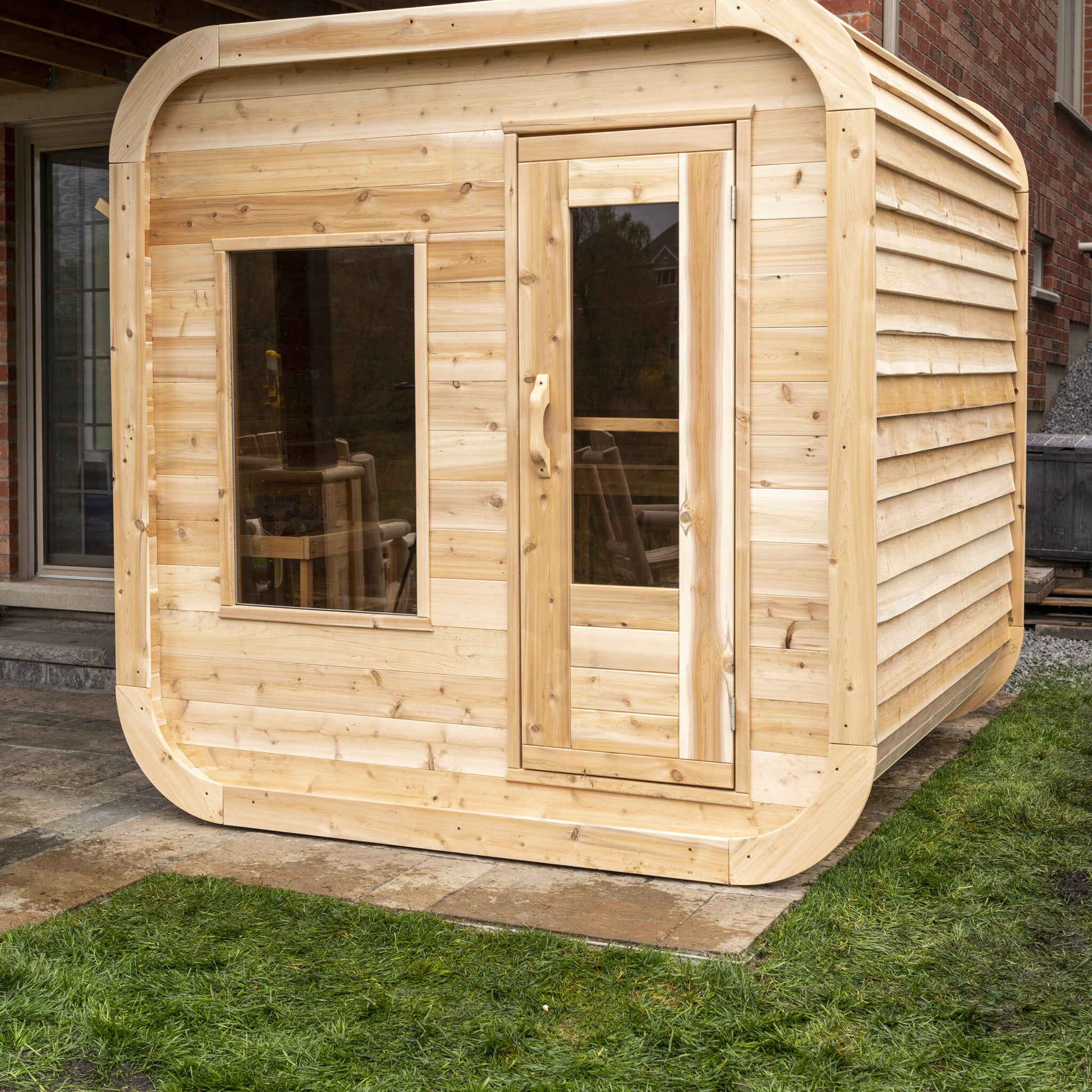 Canadian Timber Luna 4-person white cedar pod sauna, three-quarter exterior view