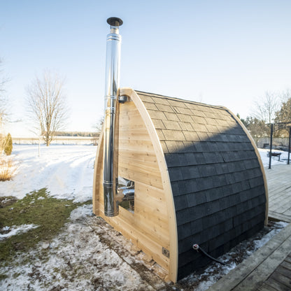 Canadian Timber Mini POD 4-person white cedar pod sauna, side exterior view in snow
