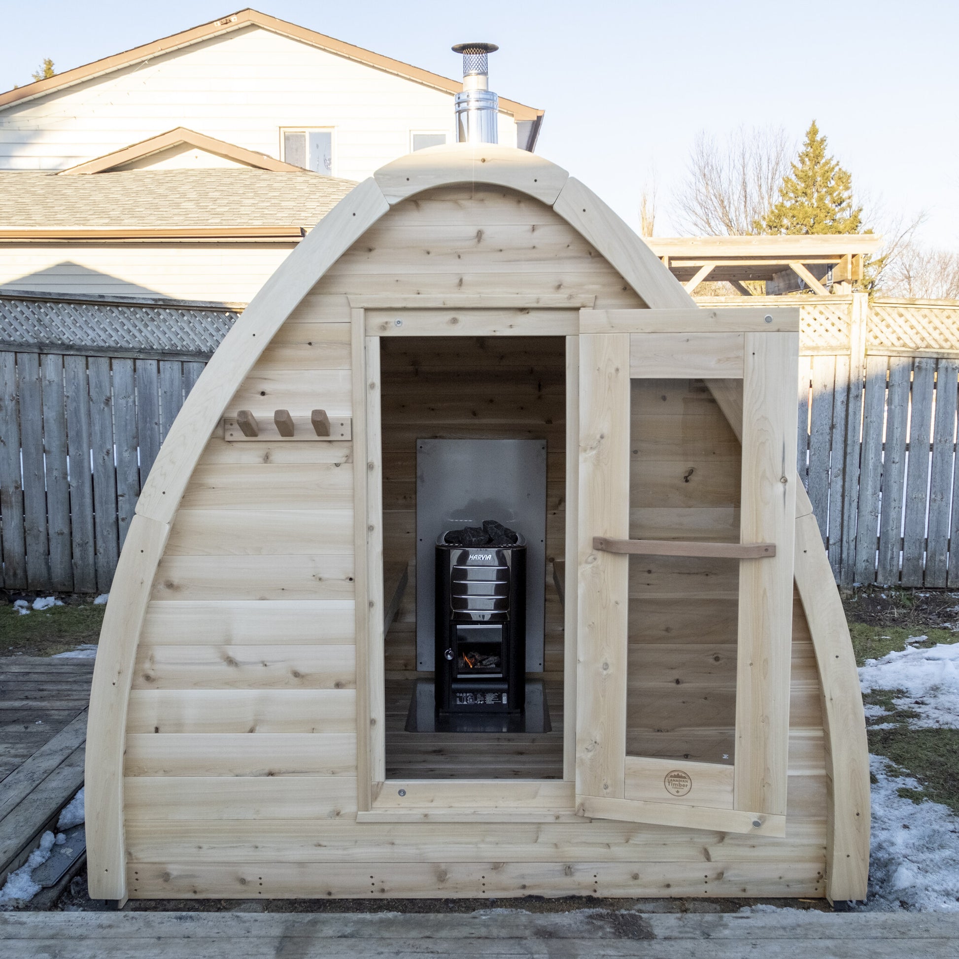 Canadian Timber Mini POD 4-person white cedar pod sauna, front exterior with the door open