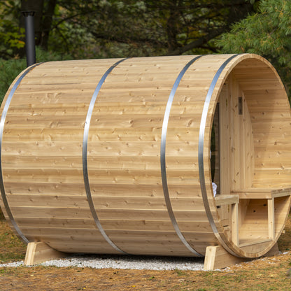 Canadian Timber Serenity 5-person white cedar barrel sauna, side view installed outdoors
