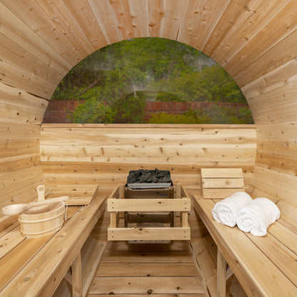Canadian Timber Serenity with Windows 5-person white cedar barrel sauna, view out through the interior window